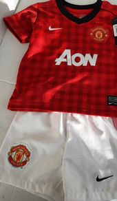 New man United collectable baby kit tags attached
