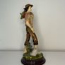 Boy with a basket figurine signed Ballester Image 2