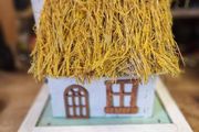 Thatched cottage bird house