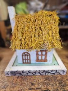 Thatched cottage bird house