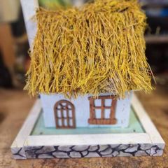 Thatched cottage bird house