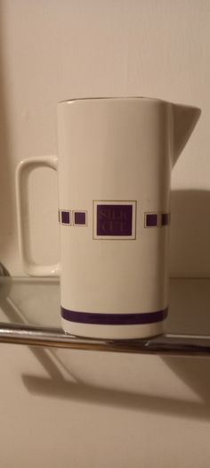 Silcut purple whiskey water jug