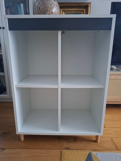 White storage cabinet with four compartments