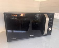 Samsung microwave oven MS23K3515AS
