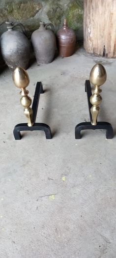 Antique Fire dogs and 4 piece fire set solid brass tops and steel