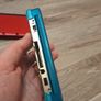 Red Nintendo 3DS xl and Aqua Blue Nintendo 3DS Image 7