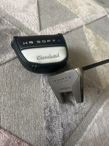 Cleveland Broomstick putter with wrapped shaft.