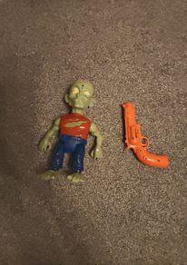gun and zombie