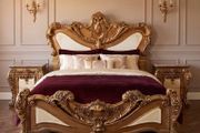 This is a very grand nice bed and two marble topped lockers.