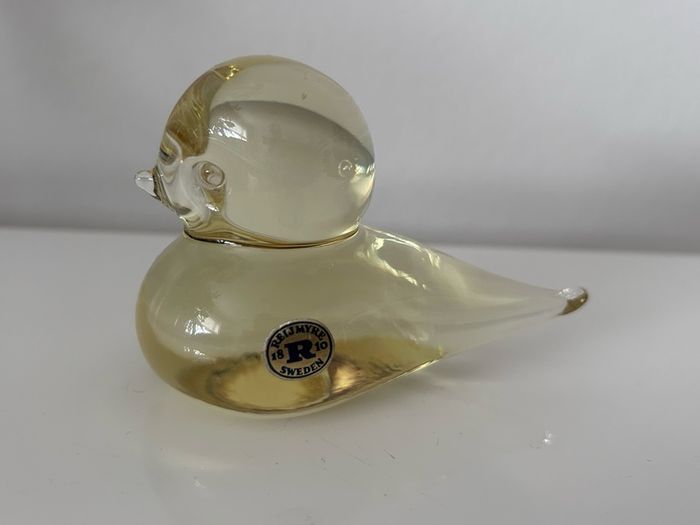 A beautiful yellow art glass bird by Reijmyre,Sweden