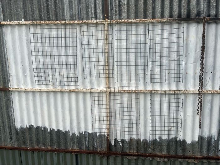 6 wire plant holders and 2 lawn plant protectors