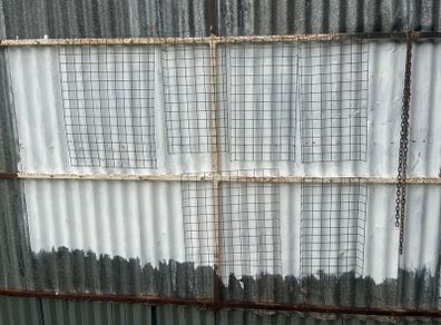 6 wire plant holders and 2 lawn plant protectors