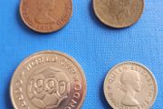 Various coins and England 1990 token