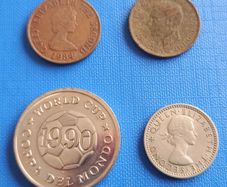 Various coins and England 1990 token