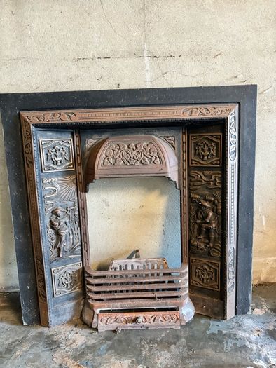 Fireplace insert and metal plinth surround