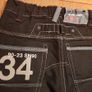 Jeans black denim Next with big back pockets white stitch and print details loose fit brand new pants trousersheight 140cm 10years Image 5