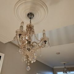 Ceiling lights. 2 Chandelier lights with 3 bulbs in each.