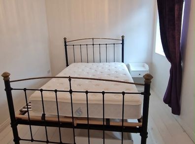 Antique king iron and brass bed frame