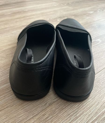 Flat slip on black women's casual shoes