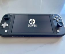 Nintendo Switch Lite (Dark Grey) + 128gb card + case + charger