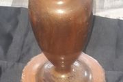 A Beautiful Vintage Wooden Vase made from a single piece of wooden log has been carefully turned on a lathe to create this urn shaped vase. Original bark details remain around the base