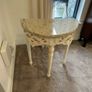 ornate half-moon console table with a granite top Image 6