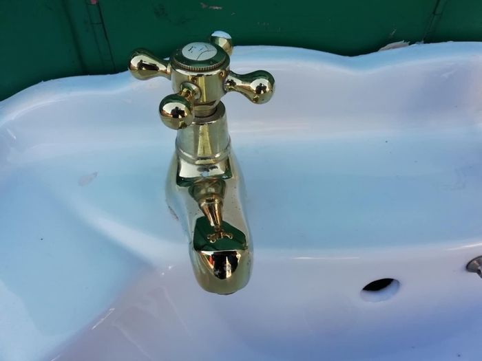 Bathroom sink, tap, support, and connections