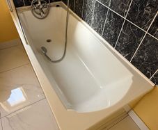 Bath with tap