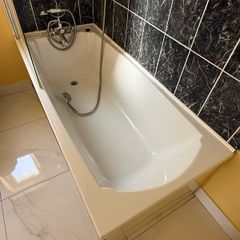 Bath with tap