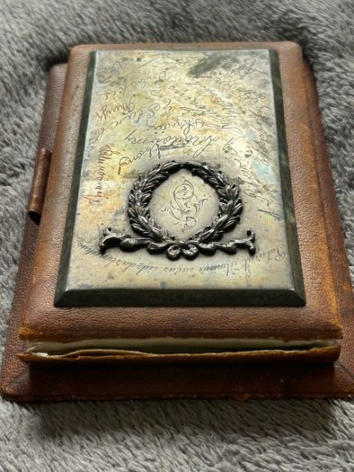 Silver vintage leather-bound notebook
