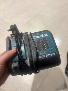 makita battery charger & 3 Battery