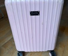 Pink midium size suitcase
