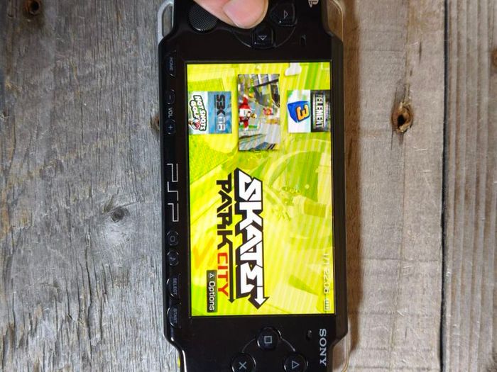 Playstation PSP modded 50 games 64gb sd card