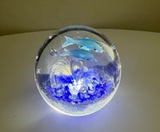 A Pair of Dolphin and Ocean themed Paperweights (One Large, One Medium)