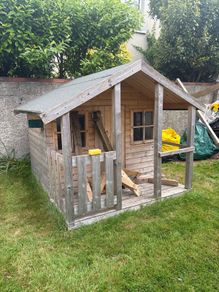 kids playhouse and swing set