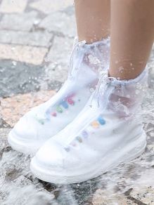 Rain boots over shoes