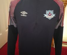 Drogheda United half zip warm up top.