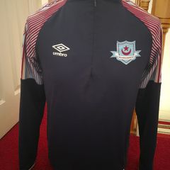 Drogheda United half zip warm up top.