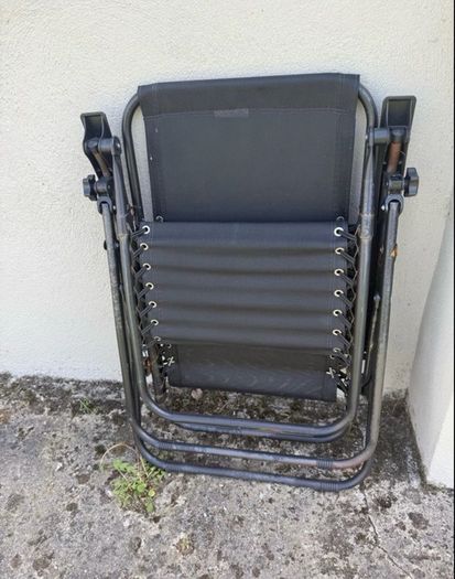 2 black recliner garden chairs