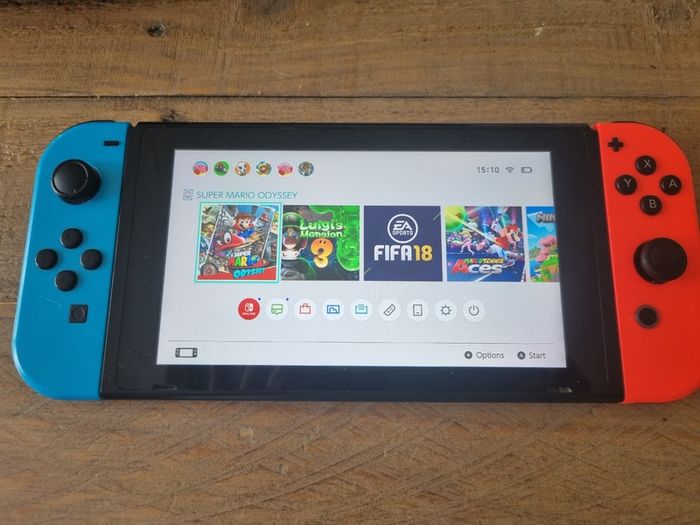 Nintendo Switch Standard Bundle + Case & 7 Games (Mario, Minecraft)