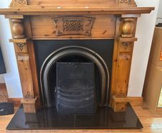 Fireplace mantle with mirror
