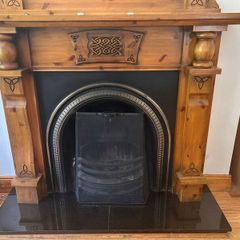 Fireplace mantle with mirror