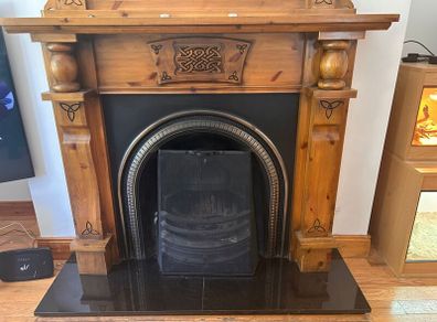 Fireplace mantle with mirror