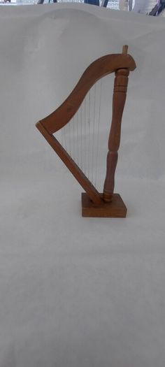 handcrafted wooden display harp ,,lovely display item for any man cave pub restaurant etc etc etc, buyer collects or pays postage.