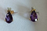 9ct yellow gold amethyst and diamond stud earrings.