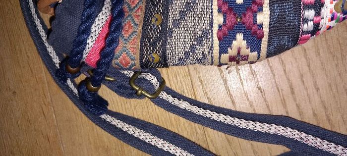 Accessorize small bucket bag