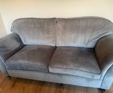 grey velvet sofa