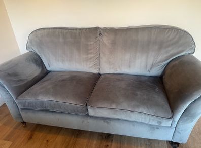 grey velvet sofa
