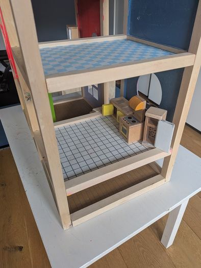 Much loved Hape Wooden Dolls House