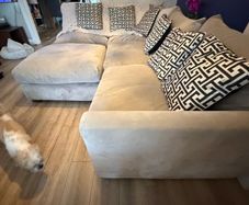 Corner sofa and foot poof